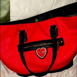 My favorite Betsey Johnson purse in the world. It’s big and red and can fit ALOT